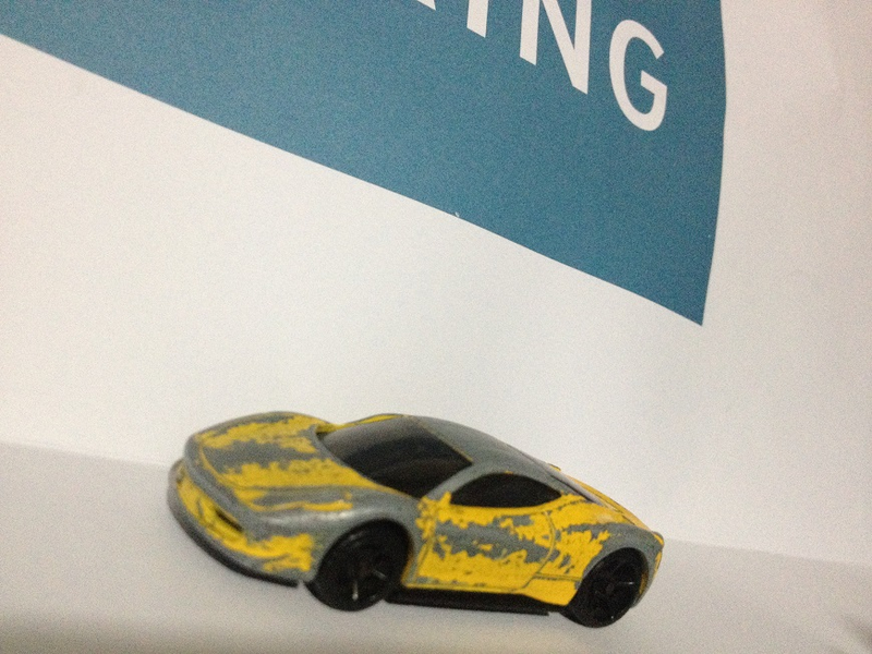 Illustration for article titled Presenting: the most beat-up (but still butt-kicking) 1:64 Ferrari 458 ever